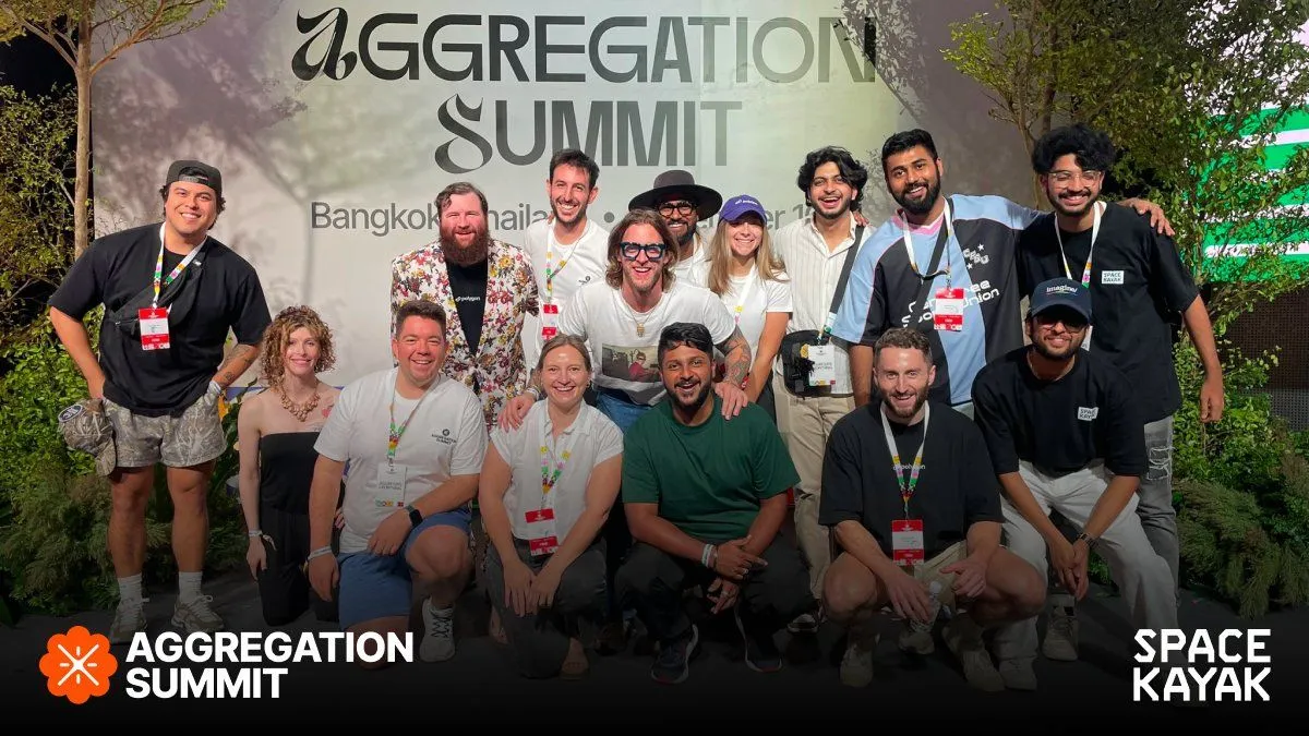 the spacekayak and polygon team at the aggregation summit backdrop in bangkok